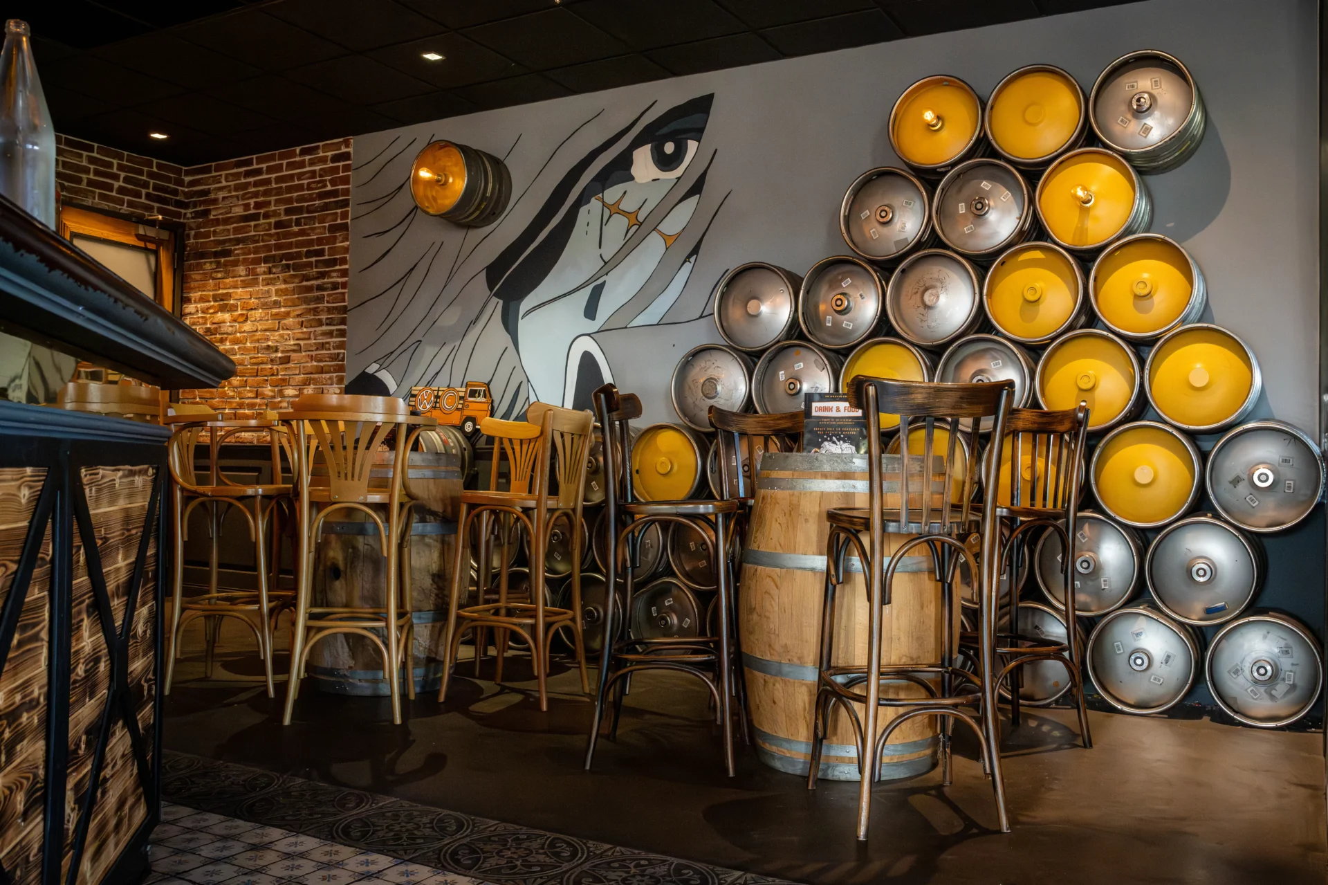Rustic bar interior with keg wall decor