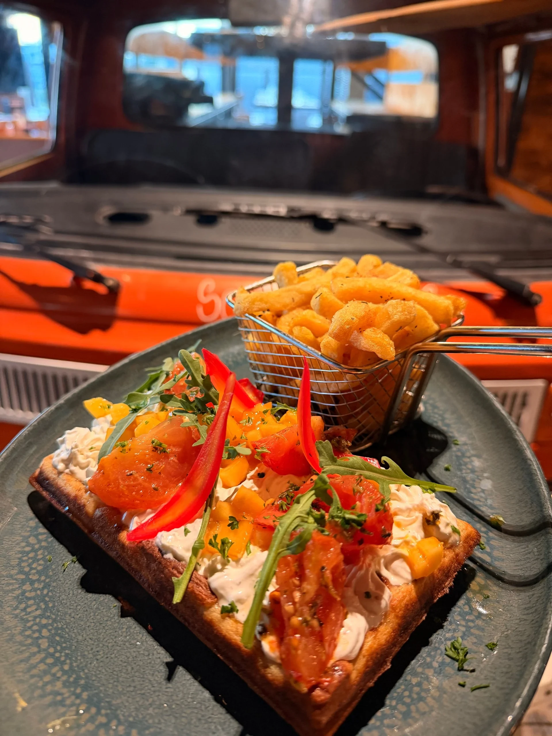 Smoked salmon toast with fries and vintage van